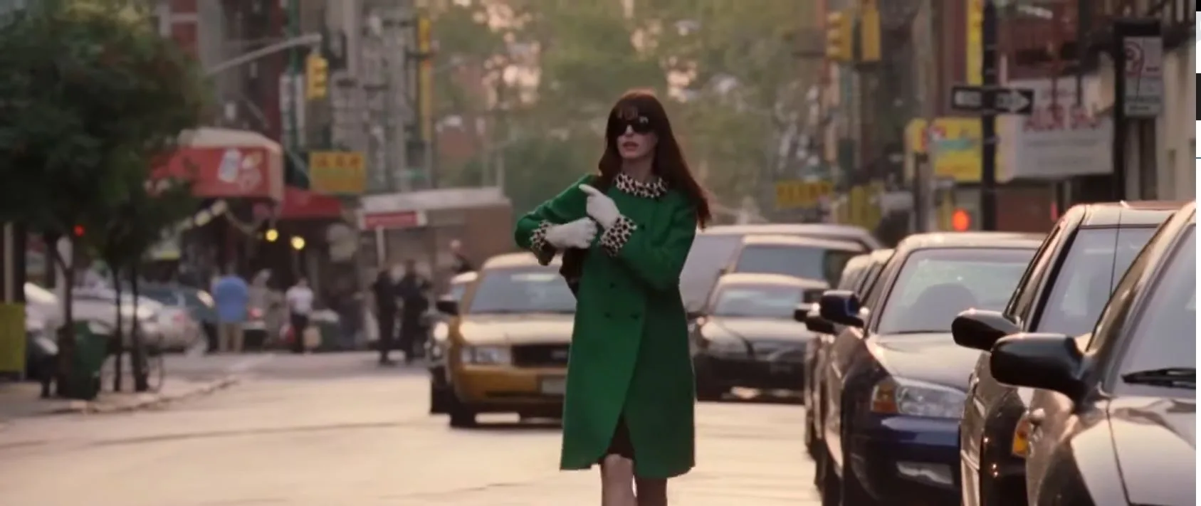 andy is a thick gren coat with leopard print trim