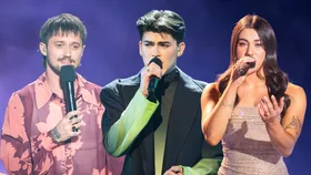 The finalists of Australian Idol singing.
