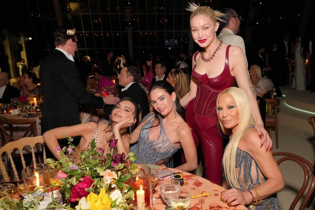 Celebrities enjoying dinner at the met gala
