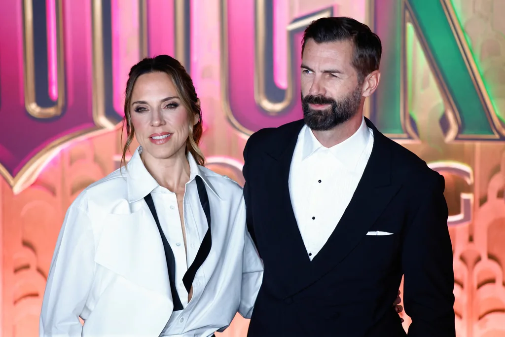 Melanie Chishom and Chris Dingwall. Credit: Getty
