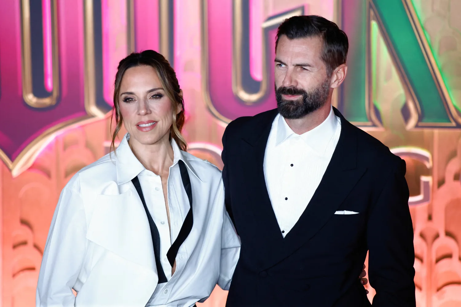 Melanie Chishom and Chris Dingwall. Credit: Getty 
