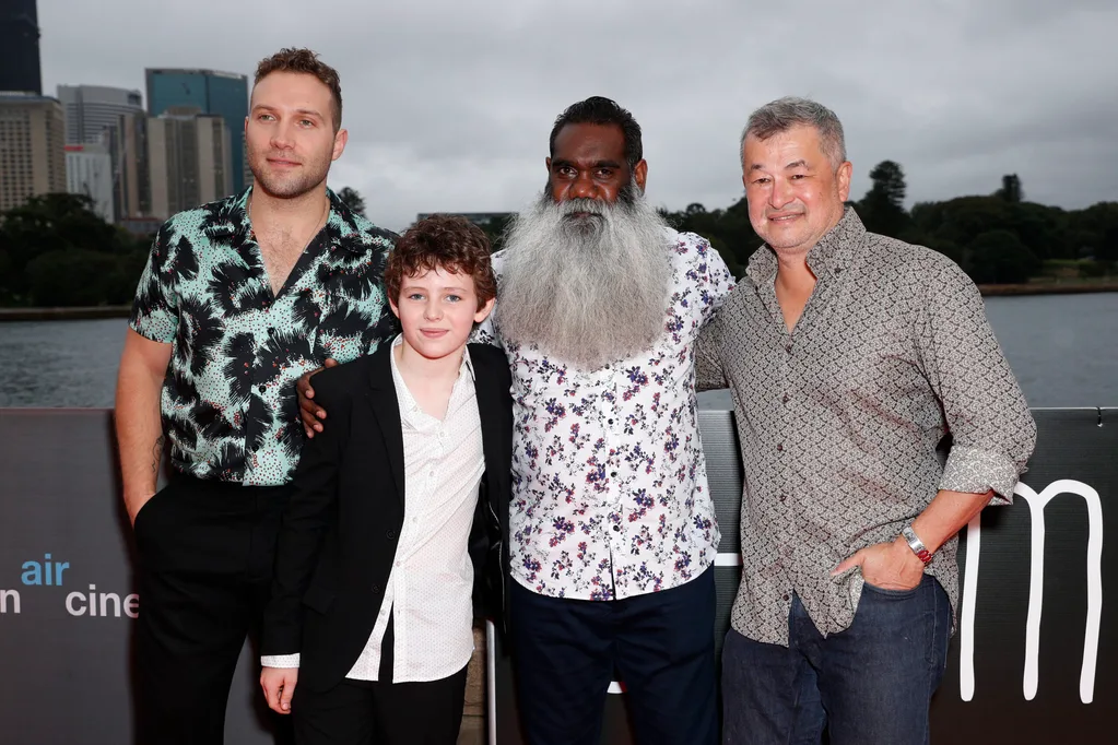 the cast of storm boy posing for a pic next to sydney harbour at the premiere