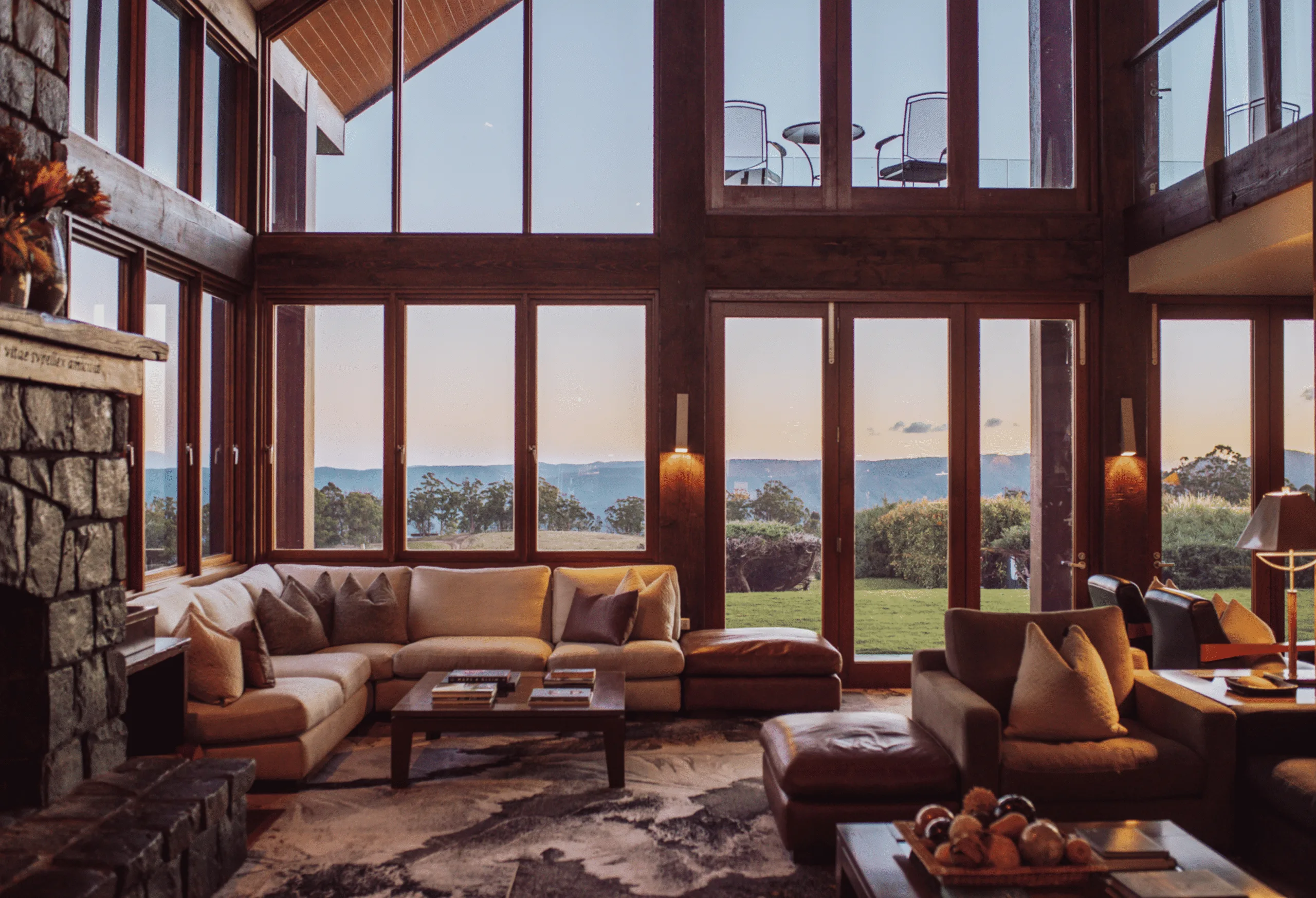 A gorgeous, glass panelled room with Told you there were breathtaking mountain views! Credit: Supplied 
