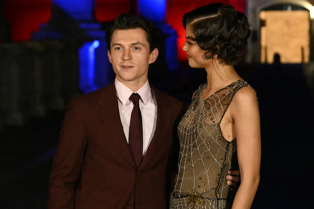 Actors Zendaya and Tom Holland pose on the bridge in front of Castel Sant'Angelo during a red carpet event for the film "Spider-Man: Brand New Day" in Rome.