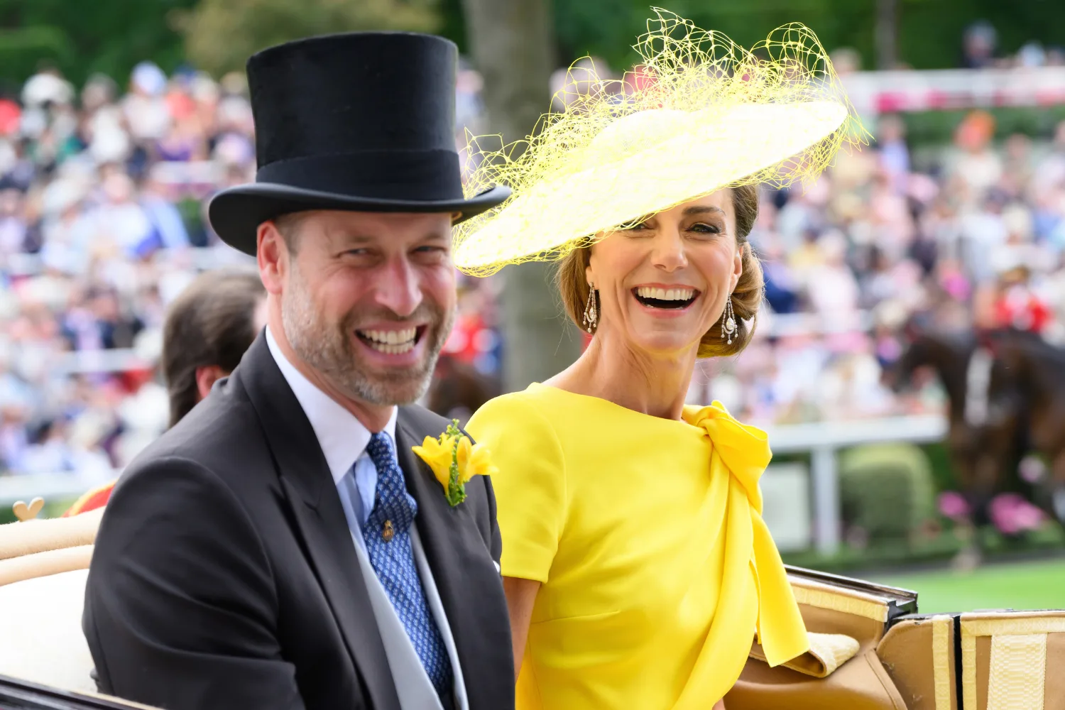  Prince William, Prince of Wales and Catherine, Princess of Wales laugh. 