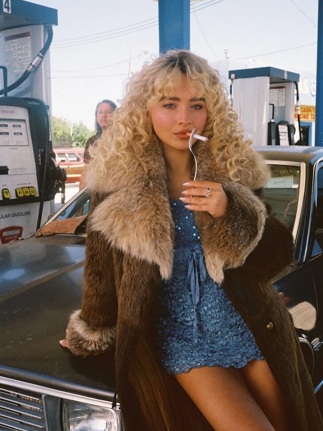 Sabrina Carpenter smoking.