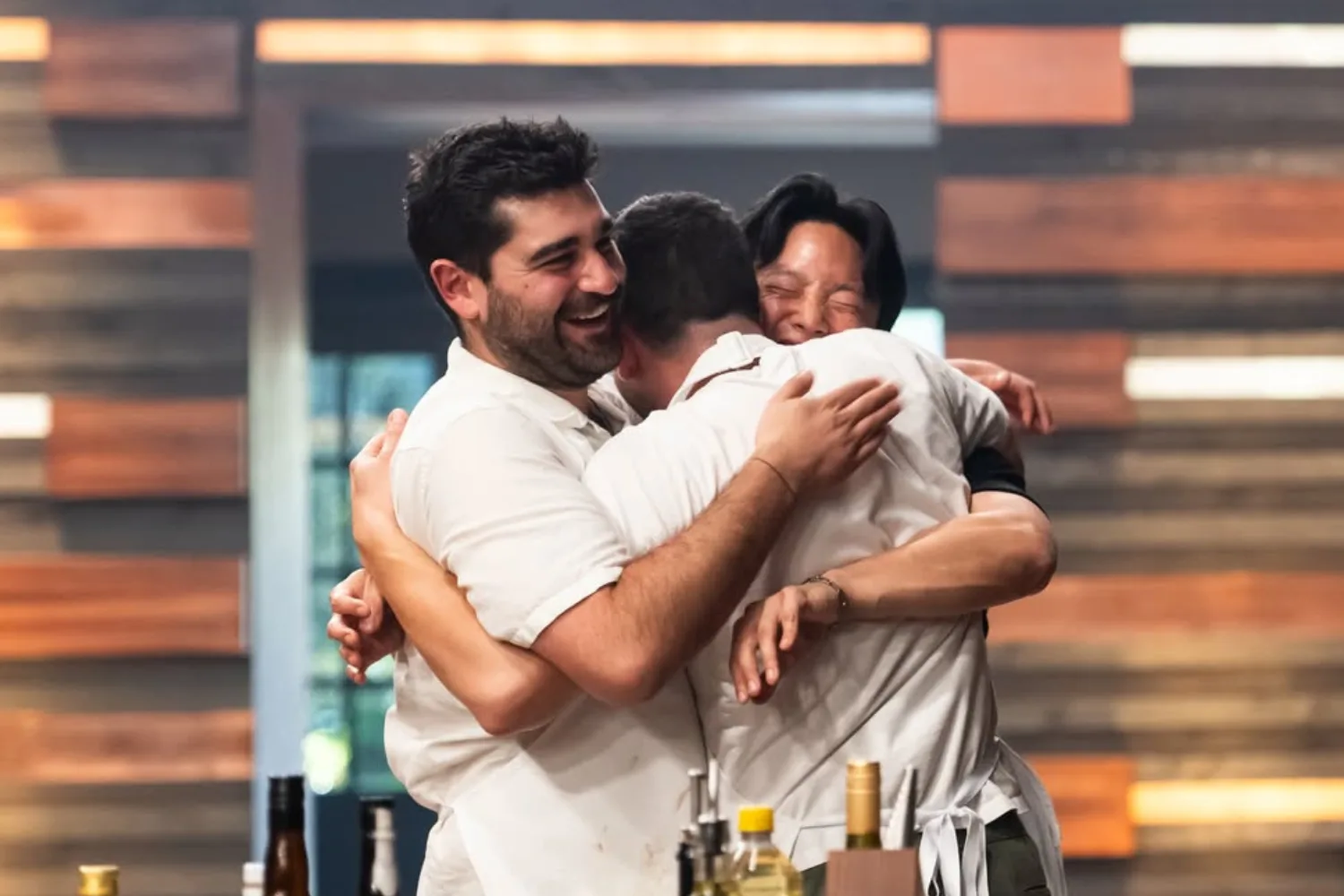 Aaron, Petro, and Vinnie hugging