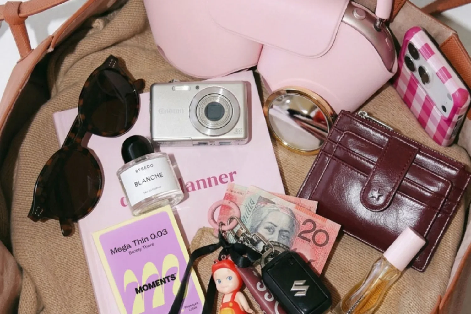Moments Wellness bag filled with condoms and other items