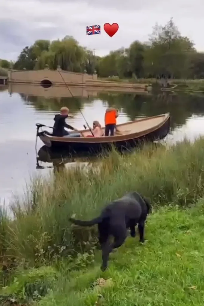 Harry and his kids in a boat