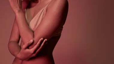 Cropped image of woman having elbow pains - stock photo.