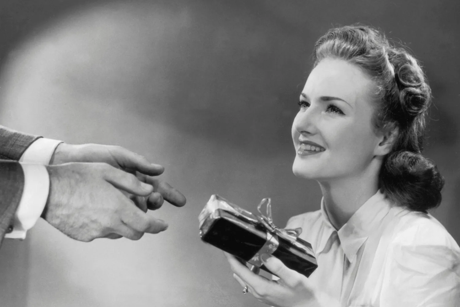 Woman getting a gift. Pic: Getty