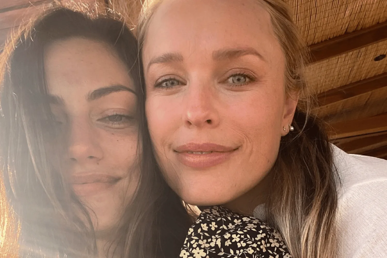 Phoebe Tonkin and Jessica McNamee smile in a photograph together