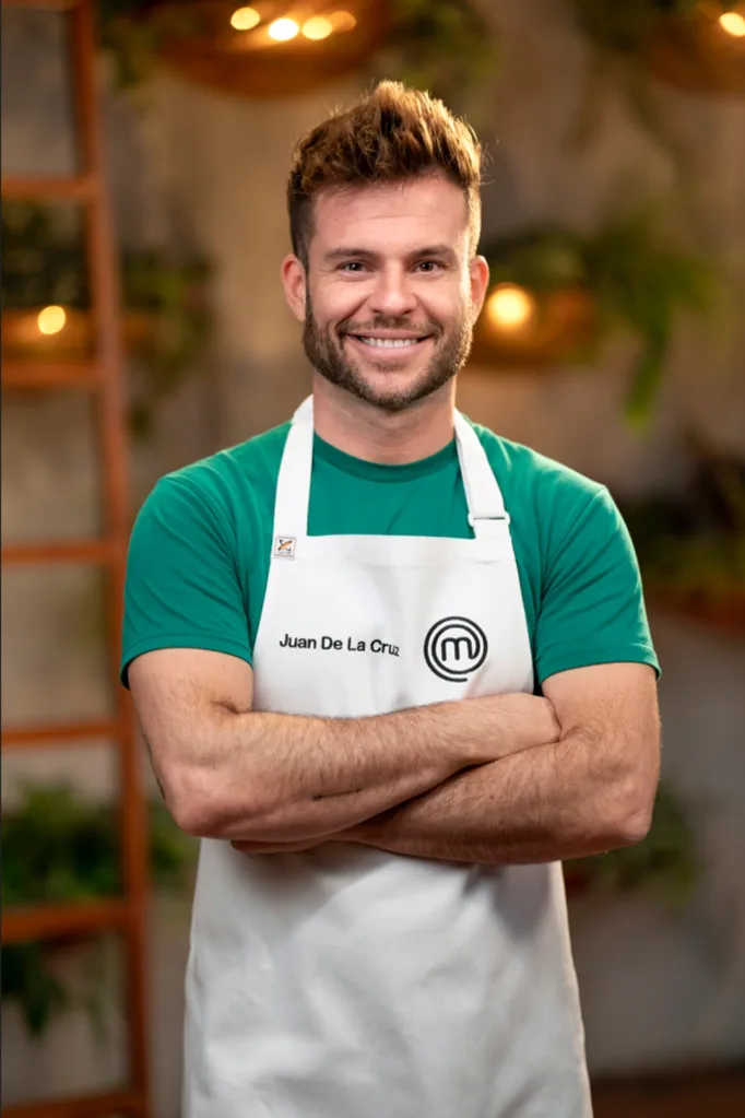 Juan De La Cruz wearing his white MasterChef apron.