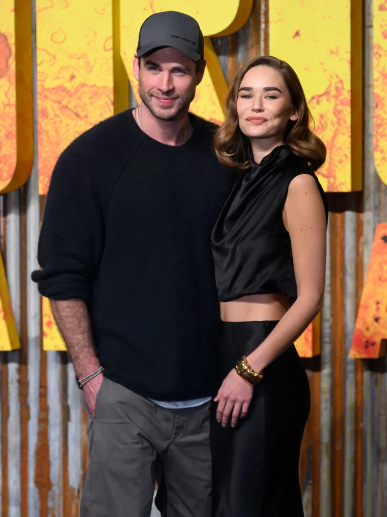 Liam Hemsworth and Gabriella Brooks attend the UK premiere for
