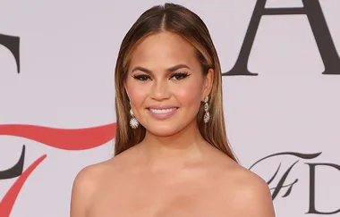 Pregnant Chrissy Teigen Goes Topless to Whip Up Some Salads