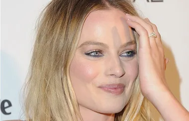Margot Robbie debuts rainbow hair at Glastonbury Festival