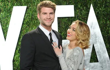 Liam Hemsworth gets a smooch from Miley Cyrus in artsy photo
