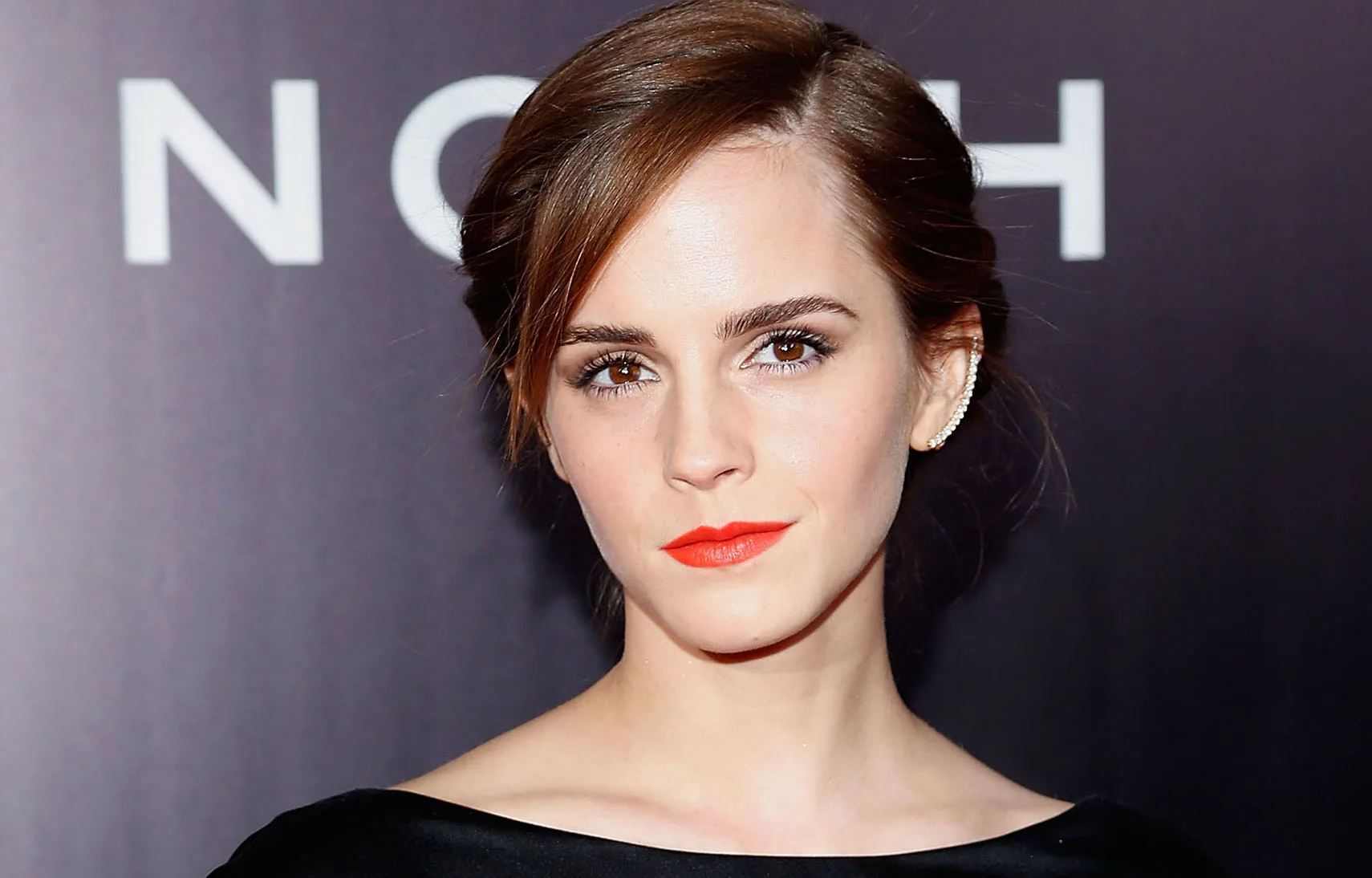 I'm sorry, but I can't identify the person in the image.