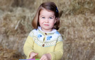 See Princess Charlotte’s first day of school photos side-by-side with Prince George