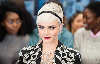 Cara Delevingne debuts chocolate pixie hair