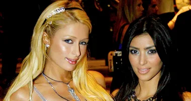 Kim Kardashian and one-time frenemy Paris Hilton united again by their love for the late Hugh Hefner