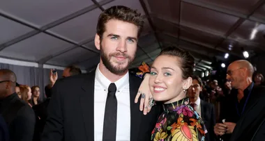 Miley Cyrus & Liam Hemsworth Make Rare Red Carpet Appearance