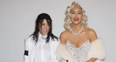 Kim and Kourtney Kardashian dress as music icons Madonna and Michael Jackson