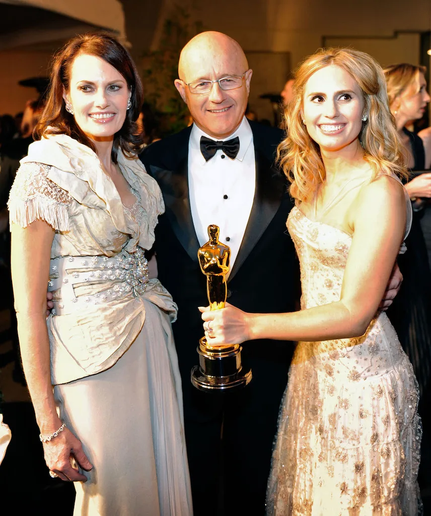 Parents Sally and Kim and sister Kate with Heath's Oscar.