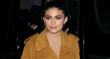 New mum Kylie Jenner goes casual in red tracksuit in post-birth outing