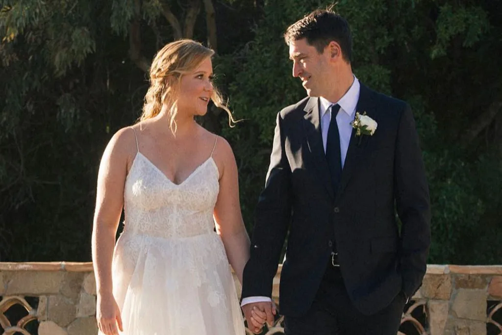 Amy Schumer and Chris Fischer