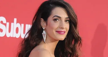 Amal Clooney steps up her street style in sexy, red lingerie top