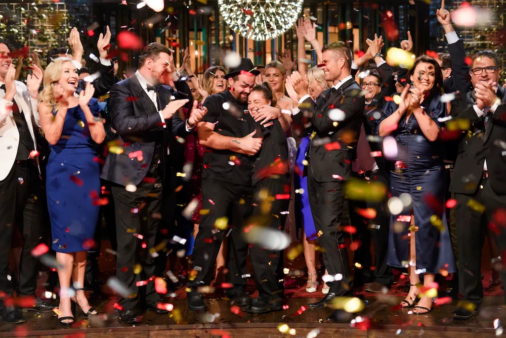 Alex and Emily share their victory with the judges and other contestants during the 'MKR' grand final.