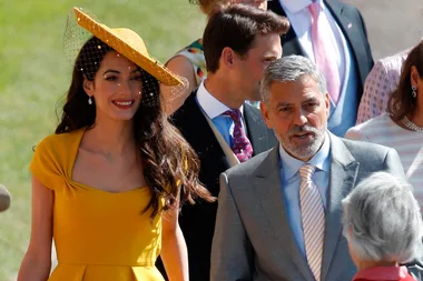 George and Amal Clooney arrive at the royal wedding