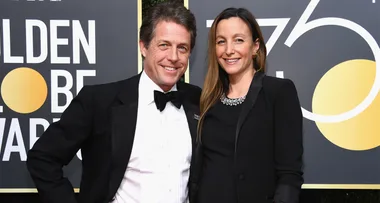 Hugh Grant and new wife Anna Eberstein step out at the Grand Prix