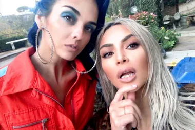 Kim Kardashian Wears Diamond ‘Kim’ Grill as She Continues Flashy Style Streak