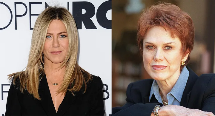 Two women side by side: one with long blonde hair and a black outfit, the other with short reddish hair and a blue shirt.