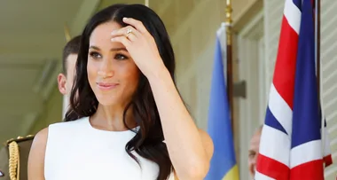 Meghan Markle and Prince Harry greeted with cheers as they arrive at the Opera House