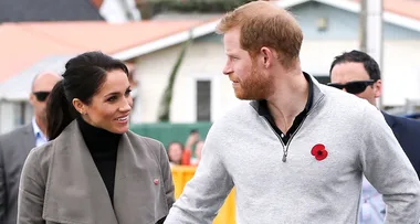 Meghan Markle looks beautiful in a Club Monaco trench coat as she and Prince Harry tour New Zealand