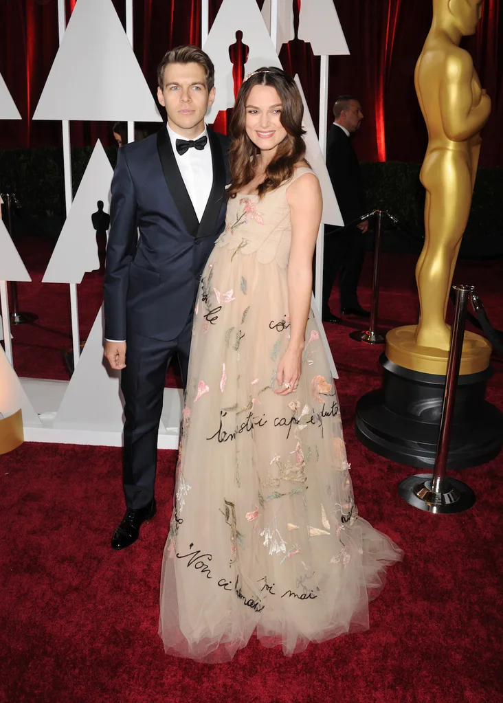 Keira in Valentino at the 87th Academy Awards with husband James