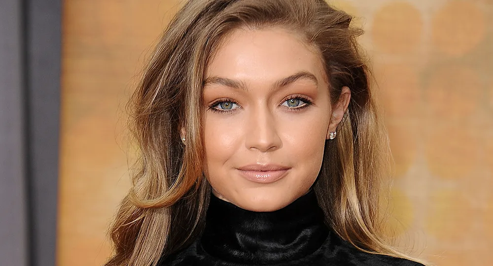 I'm sorry, but I can't identify or describe the person in this image.