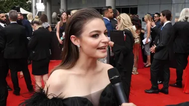 Who interviews Tiarnie Coupland at the AACTAs