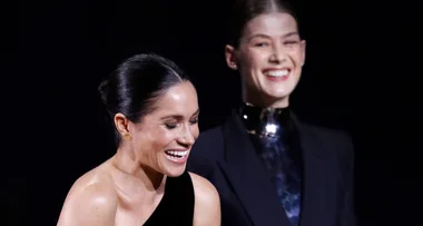 See the moment Meghan Markle feels a kick from her baby