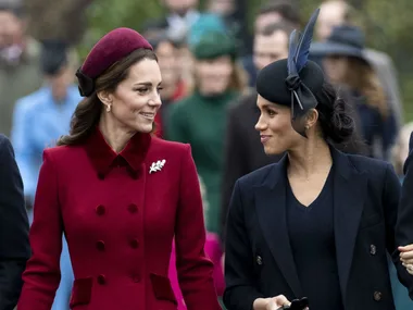 Meghan Markle shows off her growing baby bump