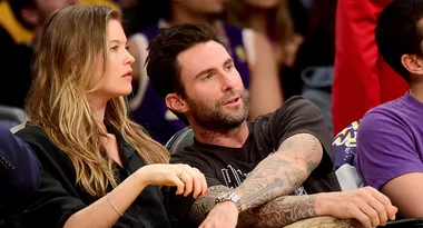 Behati Prinsloo shows off her blossoming baby bump