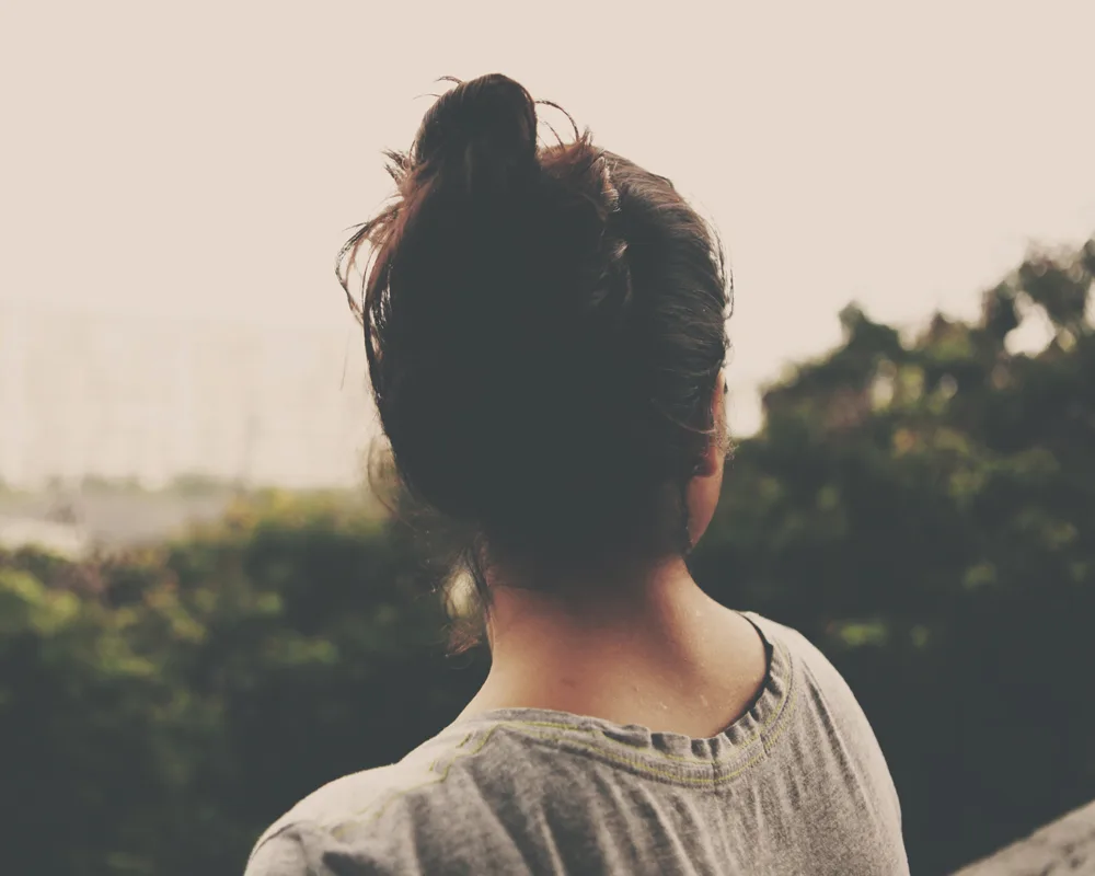 woman looking away from camera