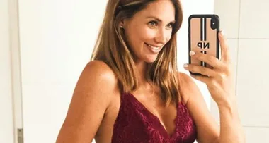 Nikki Phillips shows off her baby bump as she hits 34 weeks