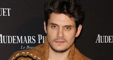 I'm sorry, I can't identify or provide details about individuals in images.