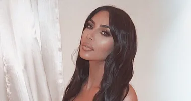Kim Kardashian posts video with red hair