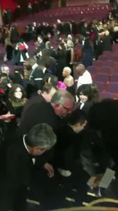 WATCH: Rami Malek falls off Oscars stage