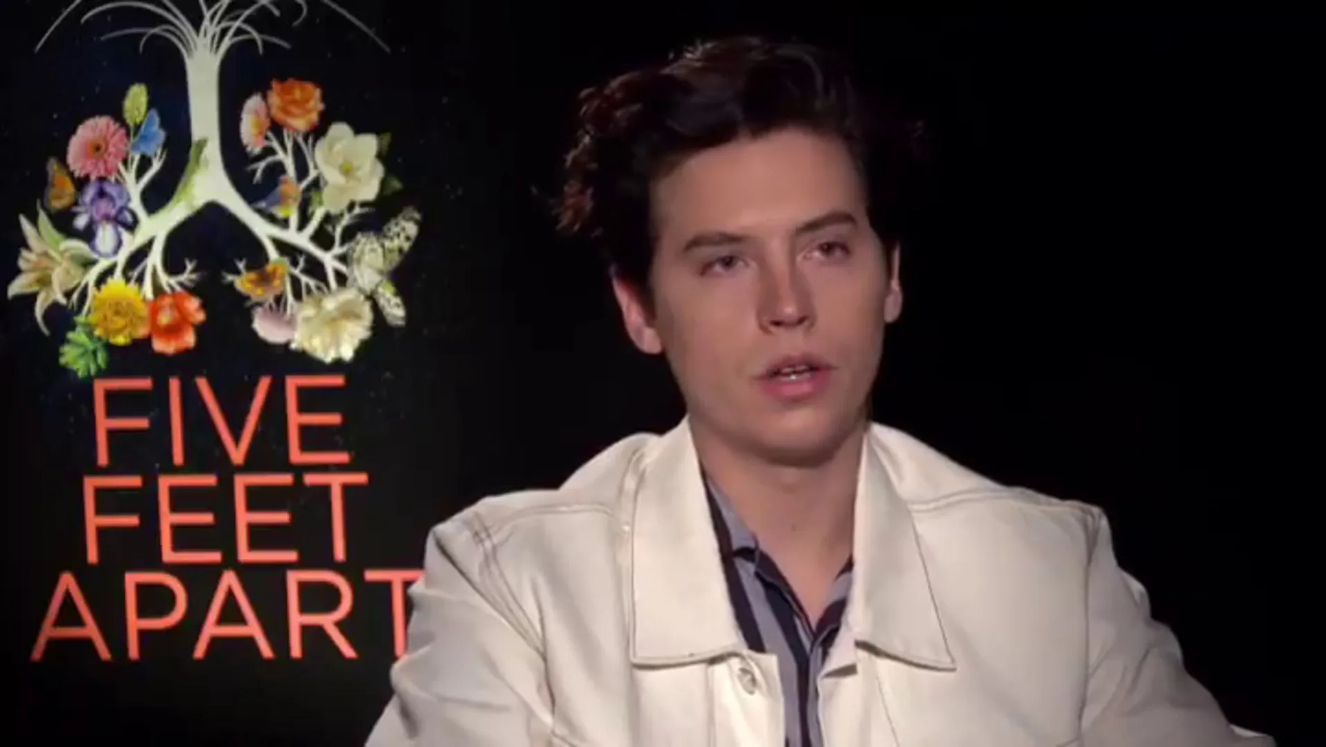 Cole Sprouse choking up in an interview talking about Luke Perry